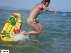 fun on a nudist beach. Thumbnail 25