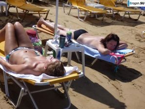 fun on a nudist beach. Thumbnail 33