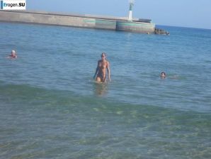 fun on a nudist beach. Thumbnail 38