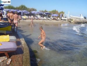fun on a nudist beach. Thumbnail 39