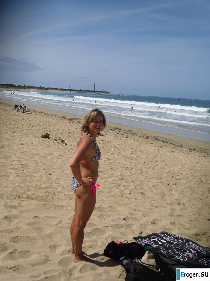 mischievous minx on the beach. Slide 57