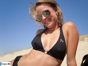 mischievous minx on the beach. Thumbnail 33