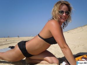 mischievous minx on the beach. Thumbnail 41