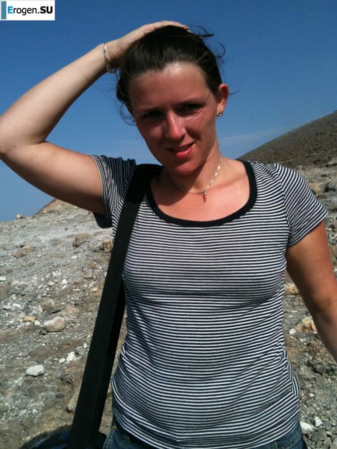 undressed on a deserted beach. Slide 1