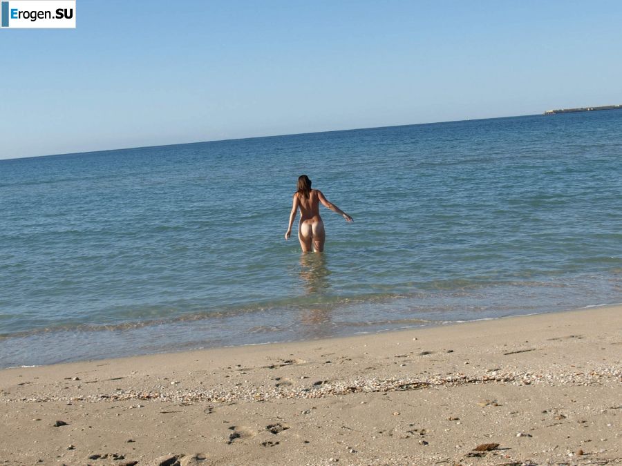 undressed on a deserted beach. Slide 13