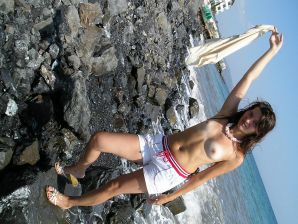 without a swimsuit on a rocky shore. Part 2. Thumbnail 1