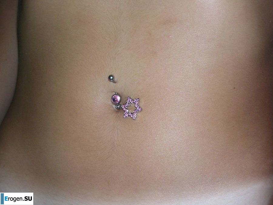 A tanned brunette shines her tits in the morning in bed. Slide 24