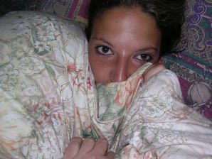 A tanned brunette shines her tits in the morning in bed. Thumbnail 11