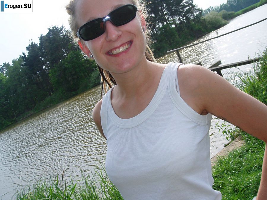 A charming girl undressed to her blouse and poses with cancer. Slide 39