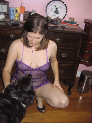 A mature woman posing in a transparent dress in front of a man. Thumbnail 29