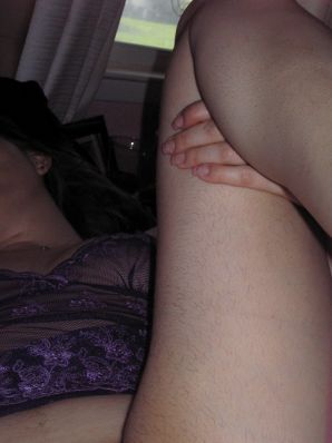 A mature woman posing in a transparent dress in front of a man. Thumbnail 38