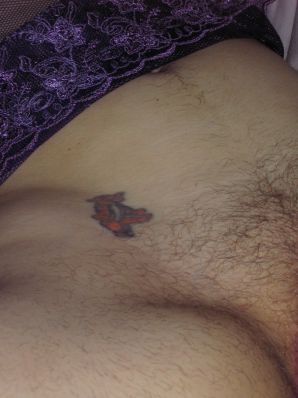 A mature woman posing in a transparent dress in front of a man. Thumbnail 40