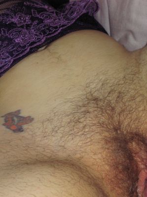 A mature woman posing in a transparent dress in front of a man. Thumbnail 41