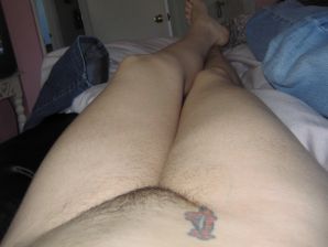 A mature woman posing in a transparent dress in front of a man. Thumbnail 9