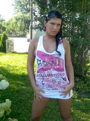 Tanned Latina with big tits shamelessly spread her legs. Thumbnail 1