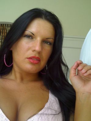 Tanned Latina with big tits shamelessly spread her legs. Thumbnail 37