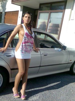 Tanned Latina with big tits shamelessly spread her legs. Thumbnail 7