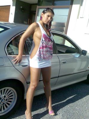 Tanned Latina with big tits shamelessly spread her legs. Thumbnail 8