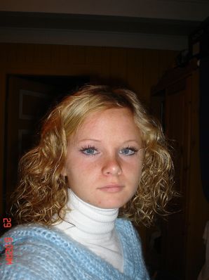 A blue-eyed minx with a pierced nipple plays with her panties. Thumbnail 40