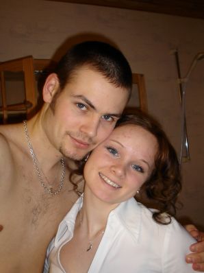 A blue-eyed minx with a pierced nipple plays with her panties. Thumbnail 5