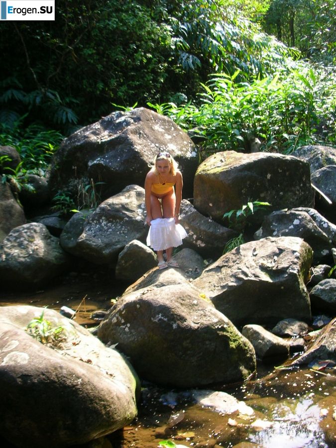 A pretty blonde is laid bare in the toilet and spreads her legs in bed. Slide 21
