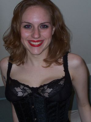 A fragile girl in a corset tied to a bed. Thumbnail 8
