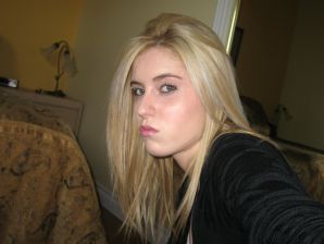 Chic blonde poses without a bra in the bathroom in front of the mirror. Thumbnail 4