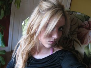 Chic blonde poses without a bra in the bathroom in front of the mirror. Thumbnail 7