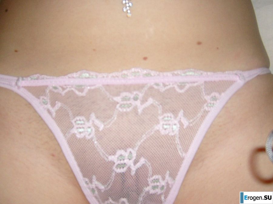 The blonde opened her labia and showed a wet vagina. Slide 15