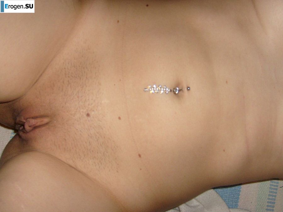 The blonde opened her labia and showed a wet vagina. Slide 17