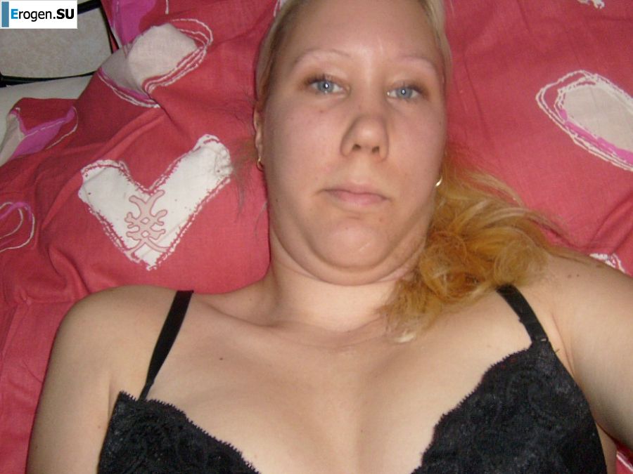 The blonde opened her labia and showed a wet vagina. Slide 21