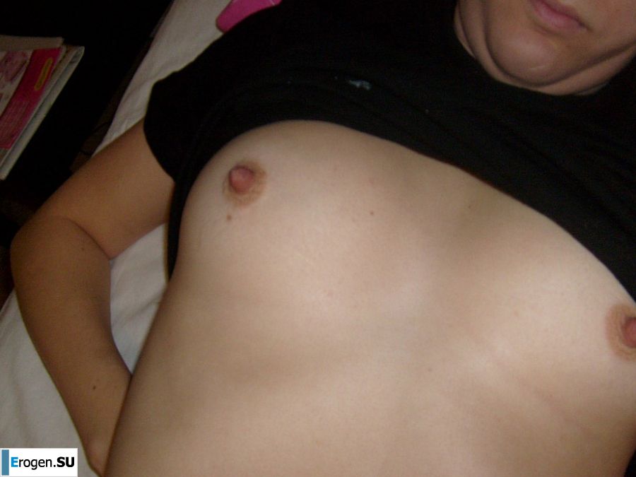 The blonde opened her labia and showed a wet vagina. Slide 25