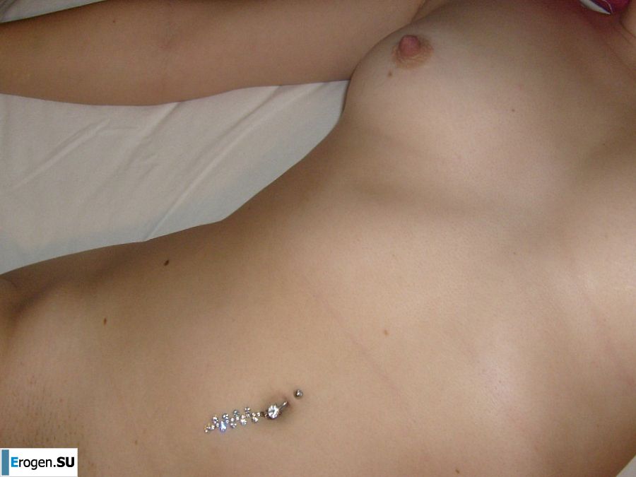 The blonde opened her labia and showed a wet vagina. Slide 27