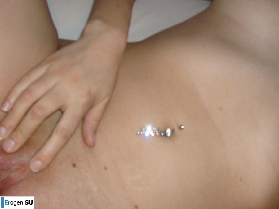 The blonde opened her labia and showed a wet vagina. Slide 29