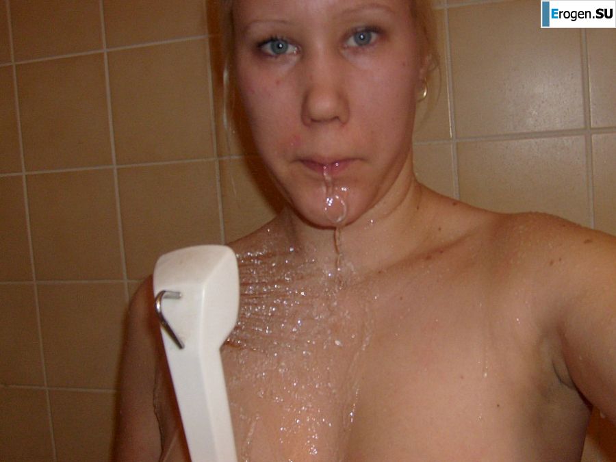 The blonde opened her labia and showed a wet vagina. Slide 3