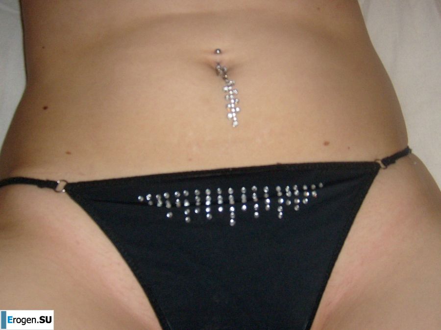 The blonde opened her labia and showed a wet vagina. Slide 8