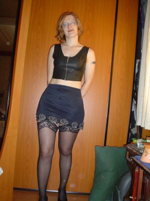 A red-haired student with glasses spread her legs in lace stockings and showed a pussy. Thumbnail 8