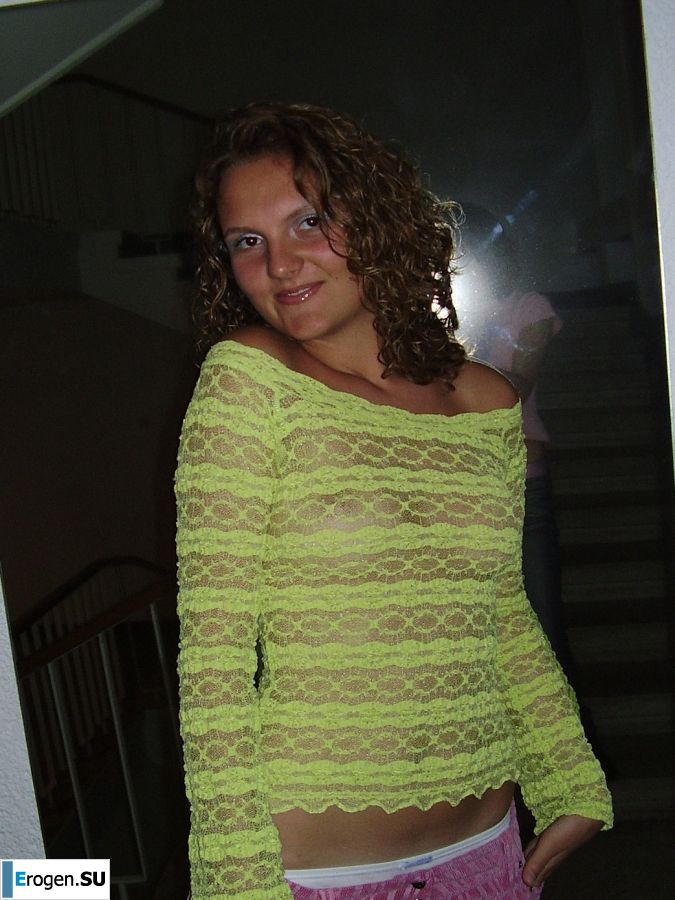 Sexy girl posing on the beach in shorts without a bra. Slide 8