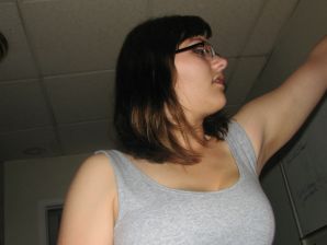 A girl with large breasts poses in clothes and then undresses. Part 2. Thumbnail 14