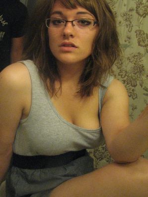 A girl with large breasts poses in clothes and then undresses. Part 2. Thumbnail 16
