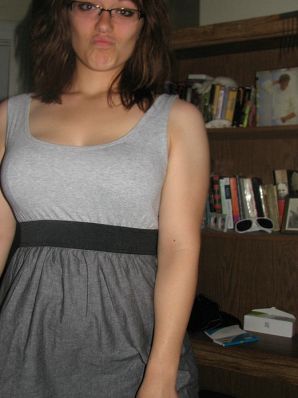 A girl with large breasts poses in clothes and then undresses. Part 2. Thumbnail 17