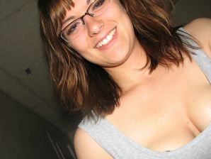 A girl with large breasts poses in clothes and then undresses. Part 2. Thumbnail 18