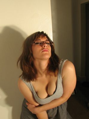 A girl with large breasts poses in clothes and then undresses. Part 2. Thumbnail 26