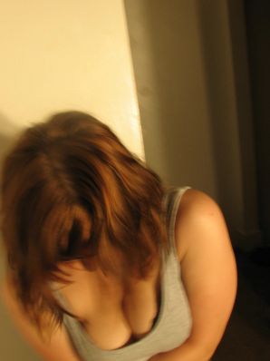 A girl with large breasts poses in clothes and then undresses. Part 2. Thumbnail 27