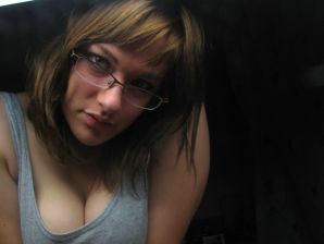 A girl with large breasts poses in clothes and then undresses. Part 2. Thumbnail 28