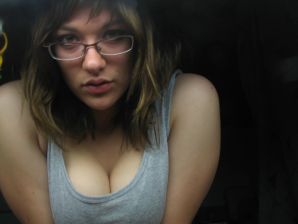 A girl with large breasts poses in clothes and then undresses. Part 2. Thumbnail 30