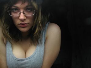 A girl with large breasts poses in clothes and then undresses. Part 2. Thumbnail 31
