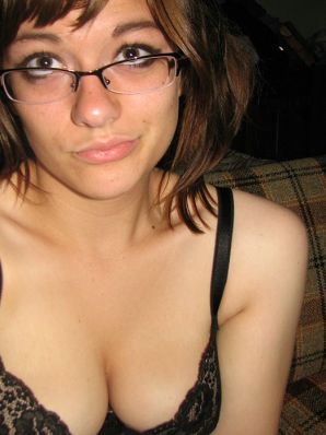 A girl with large breasts poses in clothes and then undresses. Part 2. Thumbnail 48