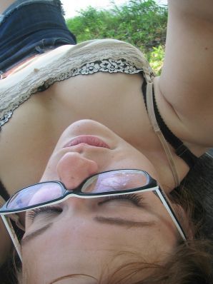 A girl with large breasts poses in clothes and then undresses. Part 2. Thumbnail 5