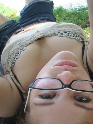A girl with large breasts poses in clothes and then undresses. Part 2. Thumbnail 6
